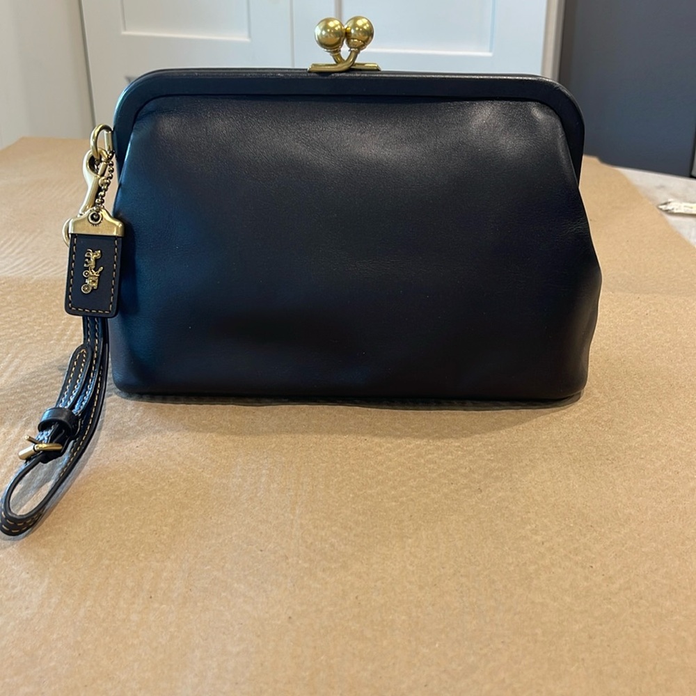 Coach black leather kisslock clutch from 1941 Collection!